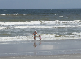 Woman and child at shore line.jpg